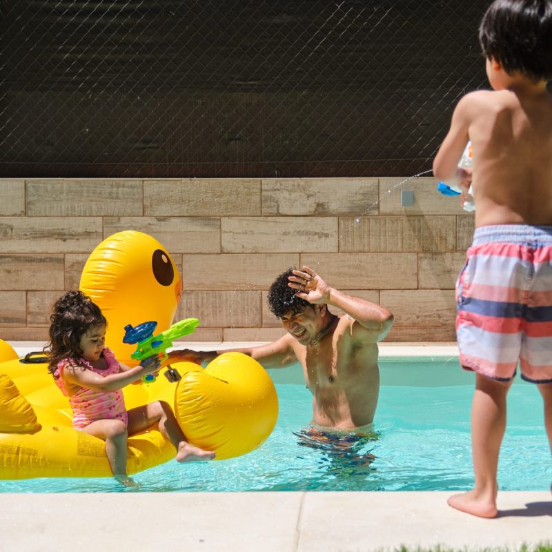 Family swimming Aquazul pool service in las vegas